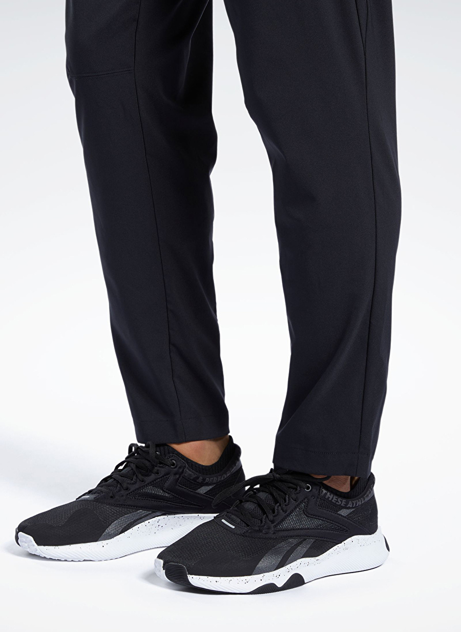 Reebok 100038337 WOR WOVEN PANT Siyah Erkek Standart fit Eşofman Altı _2