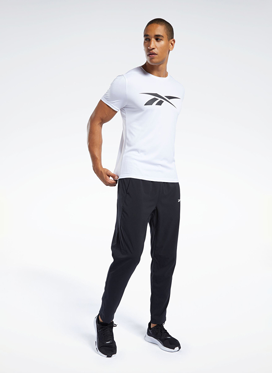 Reebok 100038337 WOR WOVEN PANT Siyah Erkek Standart fit Eşofman Altı _4